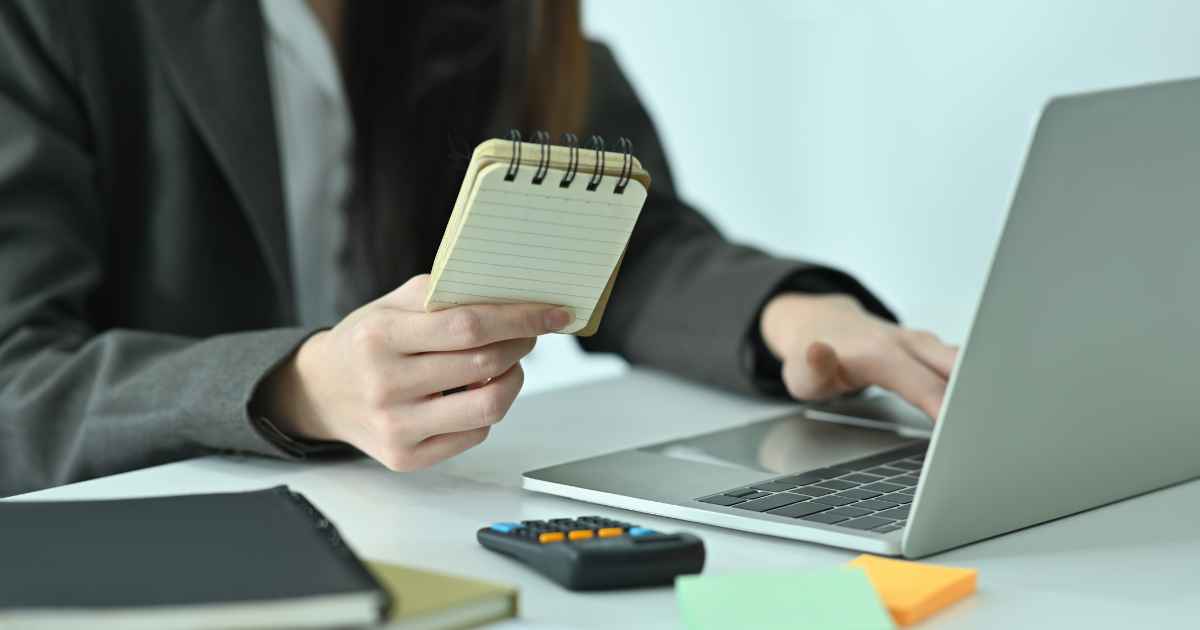 Businesswoman checking a customer's credit score