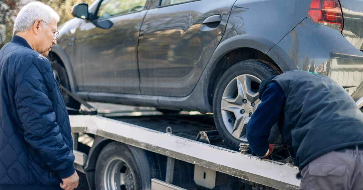 A car being towed after a customer defaulted on a title loan.