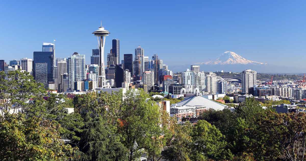 Space Needle with Mount Rainer in the background.
