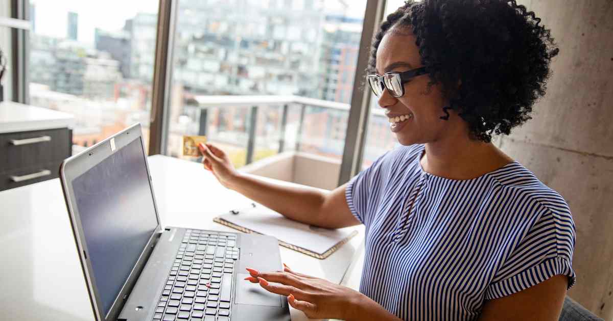 A Highway Title Loans customer checking her bank routing info before she's approved for a loan